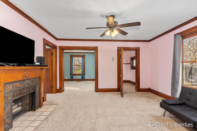 living room with a wealth of natural light, light colored carpet, and crown molding
