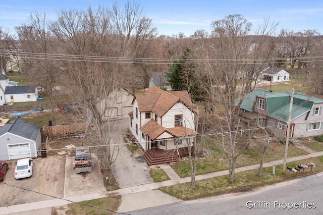 birds eye view of property with a residential view