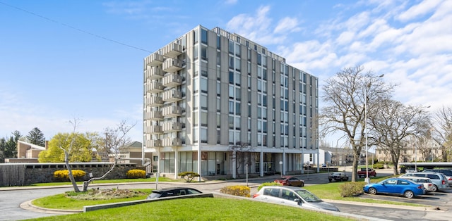 view of property with uncovered parking