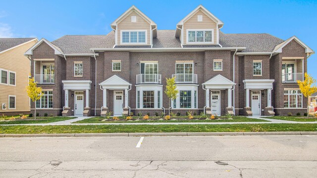 7917 Grand St, Dexter, MI 48130 - view of property featuring brick siding