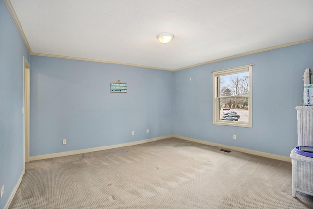 15330 Krueger St Unit 19, Spring Lake, MI 49456 - carpeted spare room featuring ornamental molding, baseboards, and visible vents
