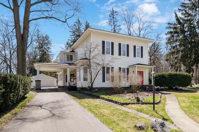 551 W Bridge St, Plainwell, MI 49080 - italianate house with a carport, an outdoor structure, and driveway