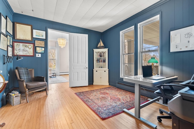 551 W Bridge St, Plainwell, MI 49080 - office area with a chandelier, hardwood / wood-style floors, ornamental molding, and a baseboard radiator