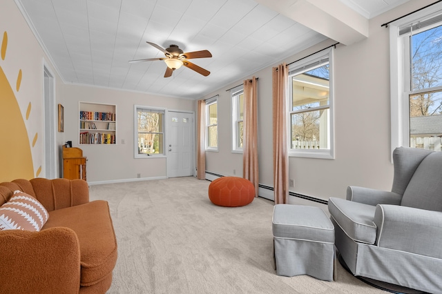 551 W Bridge St, Plainwell, MI 49080 - living room featuring crown molding, a ceiling fan, light colored carpet, and a healthy amount of sunlight