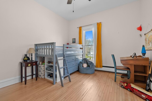 551 W Bridge St, Plainwell, MI 49080 - bedroom featuring hardwood / wood-style floors and ceiling fan