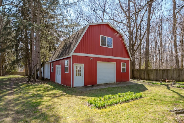 551 W Bridge St, Plainwell, MI 49080 - view of barn featuring fence and a lawn