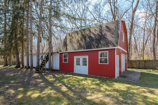 551 W Bridge St, Plainwell, MI 49080 - view of barn featuring fence and a lawn