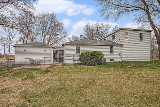 3804 Lincoln Ave, Saint Joseph, MI 49085 - back of property featuring a patio, a fenced backyard, and a lawn