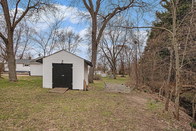 3804 Lincoln Ave, Saint Joseph, MI 49085 - view of yard featuring a storage unit and an outdoor structure