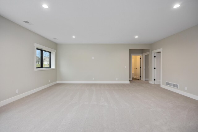 7701 Fase St SE Lot 15, Ada, MI 49301 - unfurnished room featuring visible vents, recessed lighting, baseboards, and light colored carpet