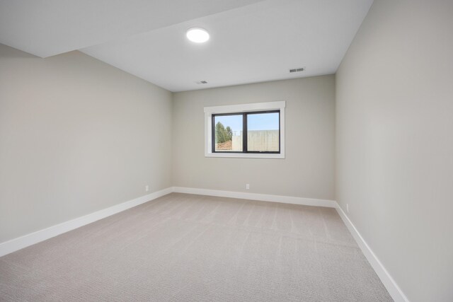 7701 Fase St SE Lot 15, Ada, MI 49301 - empty room with baseboards, light carpet, and visible vents