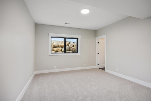 7701 Fase St SE Lot 15, Ada, MI 49301 - carpeted spare room featuring baseboards and visible vents