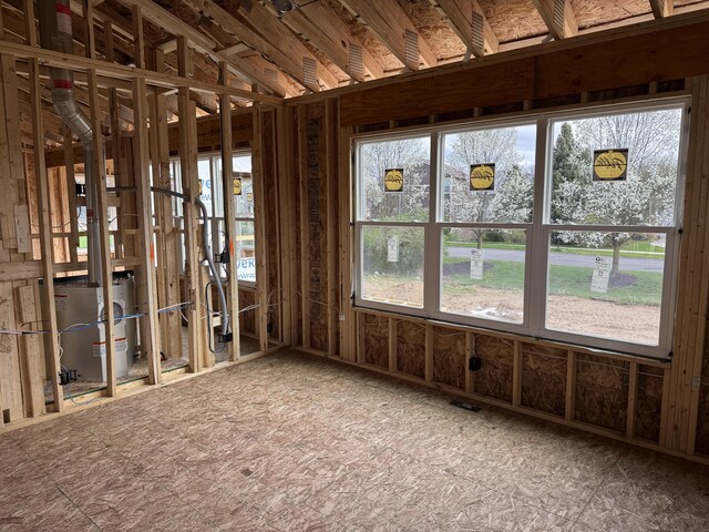 7701 Fase St SE Lot 15, Ada, MI 49301 - miscellaneous room featuring a wealth of natural light and gas water heater
