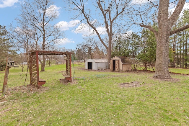 4675 Treat Hwy, Adrian, MI 49221 - view of yard with a storage shed and an outdoor structure