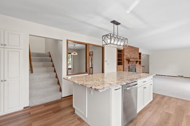 4675 Treat Hwy, Adrian, MI 49221 - kitchen with open floor plan, light stone counters, light wood finished floors, and white cabinets