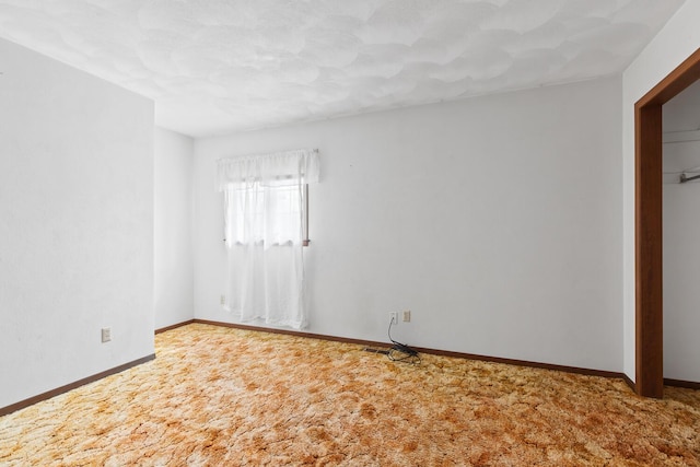 4675 Treat Hwy, Adrian, MI 49221 - empty room featuring baseboards and carpet floors