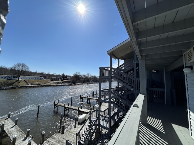 dock area with a water view