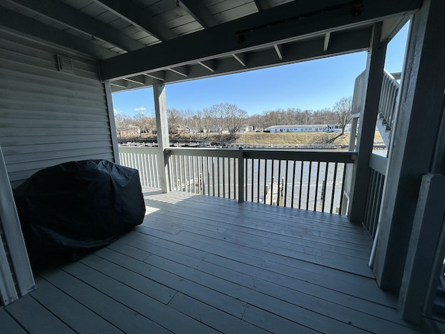 deck featuring a grill