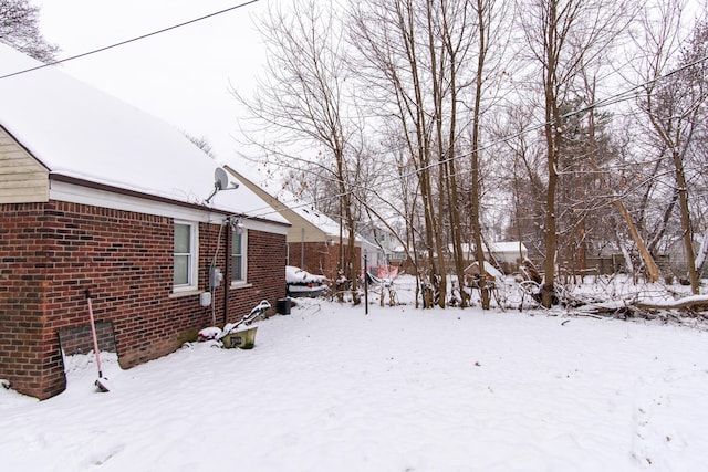 view of yard covered in snow