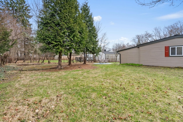 2817 Cumberland Ave, Ann Arbor, MI 48104 - view of yard featuring fence and a trampoline