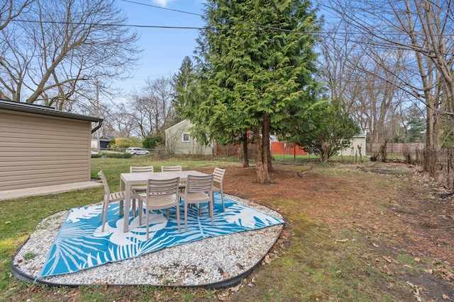 2817 Cumberland Ave, Ann Arbor, MI 48104 - view of yard with a patio, outdoor dining space, and a fenced backyard