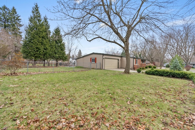 2817 Cumberland Ave, Ann Arbor, MI 48104 - view of yard with a garage and fence