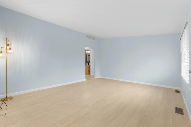 2817 Cumberland Ave, Ann Arbor, MI 48104 - unfurnished room with visible vents, baseboards, and light wood-style floors