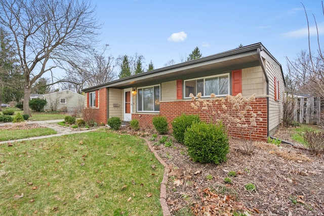 2817 Cumberland Ave, Ann Arbor, MI 48104 - ranch-style home with brick siding and a front yard