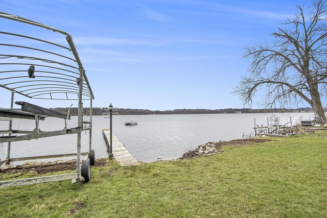 15095 N Barton Lake Dr, Vicksburg, MI 49097 - view of dock with a yard and a water view