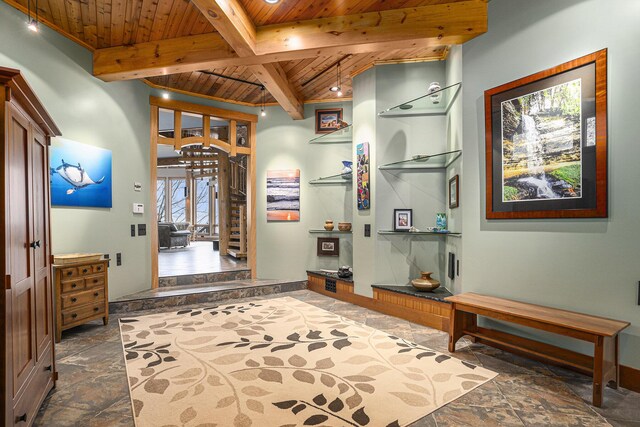 6993 S Lakeshore Dr, Pentwater, MI 49449 - corridor with recessed lighting, stone tile floors, wood ceiling, and beamed ceiling