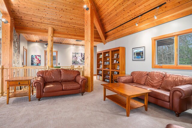 6993 S Lakeshore Dr, Pentwater, MI 49449 - living room with beamed ceiling, wooden ceiling, and carpet floors
