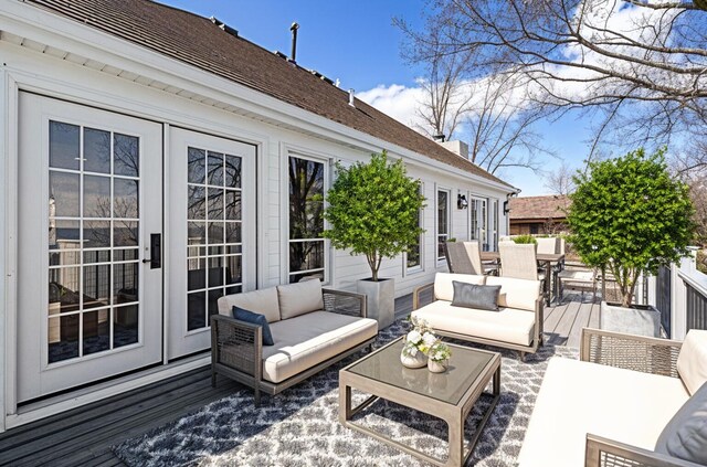 6376 Sterling Dr, Newport, MI 48166 - wooden deck featuring french doors, outdoor dining area, and an outdoor hangout area