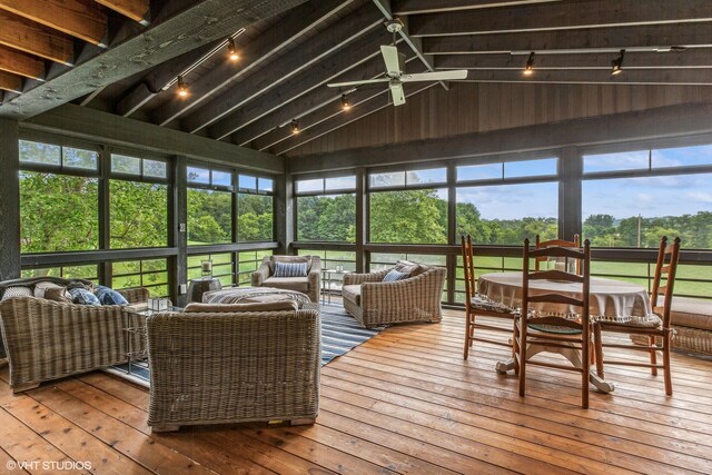 12801 Hills Rd, Buchanan, MI 49107 - sunroom featuring a ceiling fan, rail lighting, outdoor lounge area, and beam ceiling