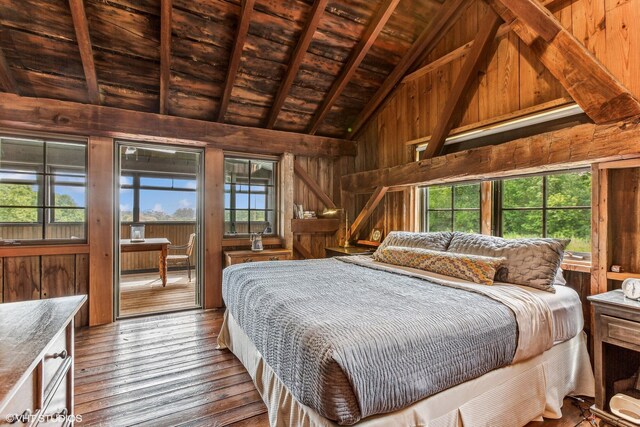 12801 Hills Rd, Buchanan, MI 49107 - bedroom with wood ceiling, dark wood-style flooring, beam ceiling, wooden walls, and access to outside