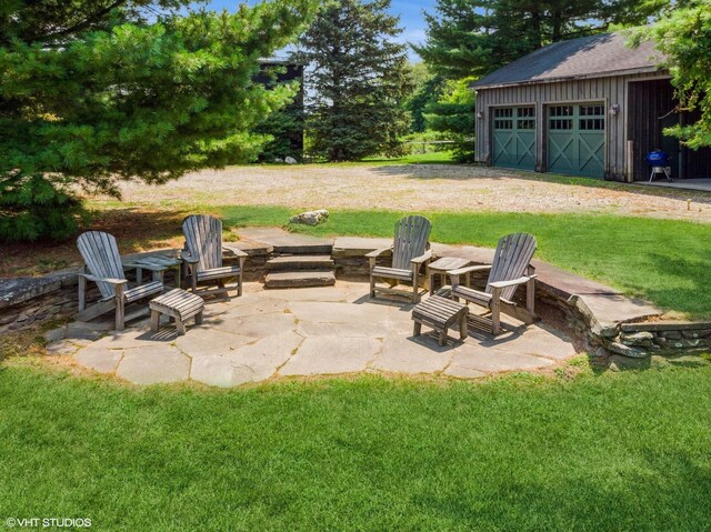 12801 Hills Rd, Buchanan, MI 49107 - view of patio featuring an outbuilding