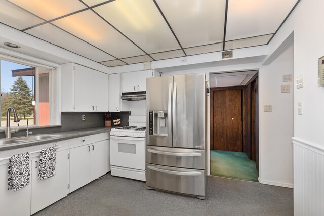 7190 Thornapple River Ct SE, Alto, MI 49302 - kitchen featuring stainless steel fridge with ice dispenser, white range with gas stovetop, white cabinets, under cabinet range hood, and a sink