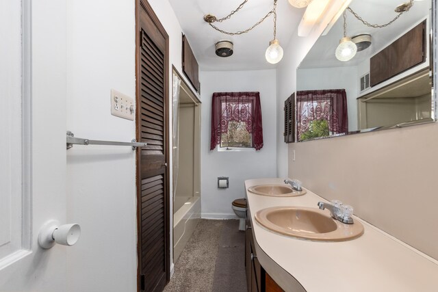 7190 Thornapple River Ct SE, Alto, MI 49302 - full bath featuring double vanity, baseboards, a sink, and toilet