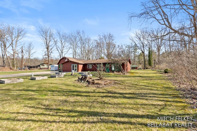 7190 Thornapple River Ct SE, Alto, MI 49302 - view of front of home with a front yard