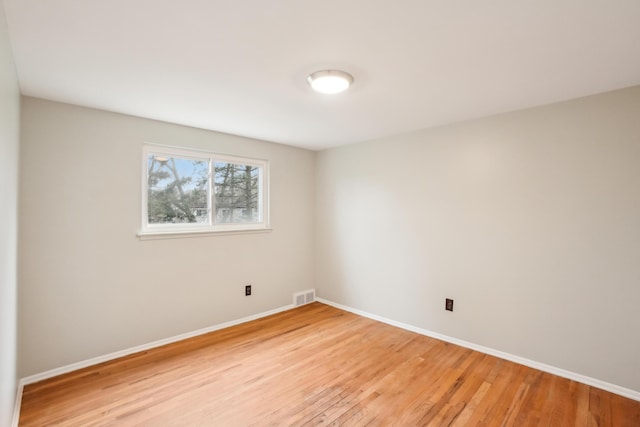 2380 Nixon Rd, Ann Arbor, MI 48105 - spare room with visible vents, light wood-type flooring, and baseboards