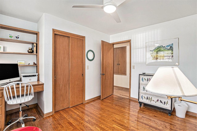 575 Glenwood Ave, Muskegon, MI 49445 - office featuring a ceiling fan, wood finished floors, baseboards, and built in desk