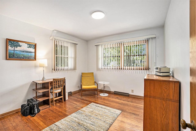 575 Glenwood Ave, Muskegon, MI 49445 - sitting room with wood finished floors and baseboards