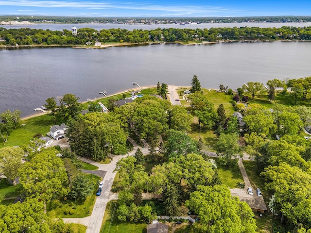575 Glenwood Ave, Muskegon, MI 49445 - aerial view of property and surrounding area with a nearby body of water and a tree filled landscape