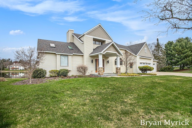 921 Meadow Ridge Dr, Holland, MI 49424 - craftsman-style home featuring a front lawn, an attached garage, a chimney, a shingled roof, and driveway