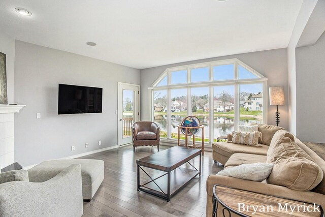 921 Meadow Ridge Dr, Holland, MI 49424 - living room with recessed lighting, baseboards, and wood finished floors