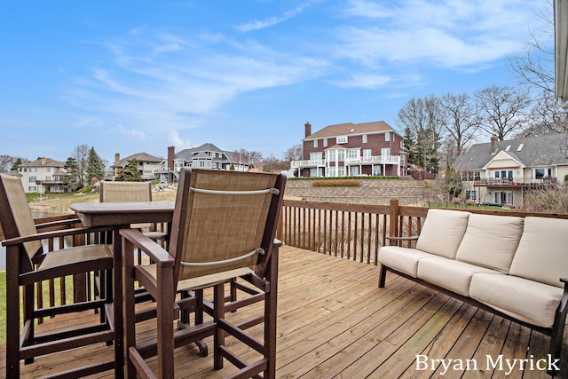 921 Meadow Ridge Dr, Holland, MI 49424 - wooden terrace with a residential view and outdoor lounge area