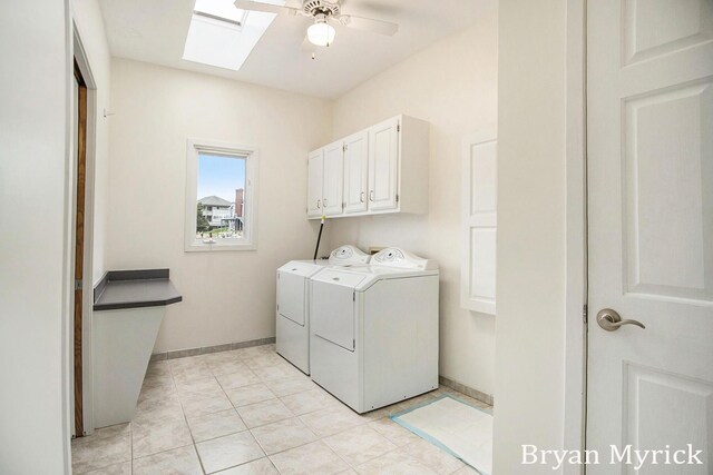 921 Meadow Ridge Dr, Holland, MI 49424 - clothes washing area with a skylight, baseboards, a ceiling fan, independent washer and dryer, and cabinet space
