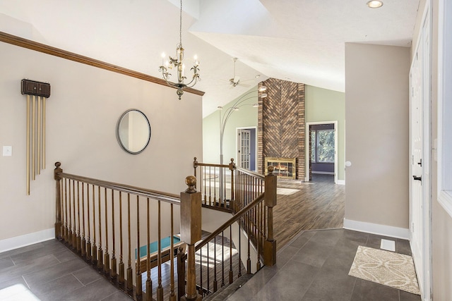 620 Twin Lakes Dr NE, Grand Rapids, MI 49525 - hall with an upstairs landing, a chandelier, lofted ceiling, baseboards, and recessed lighting