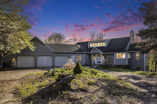620 Twin Lakes Dr NE, Grand Rapids, MI 49525 - view of front of property featuring dirt driveway, an attached garage, and a chimney