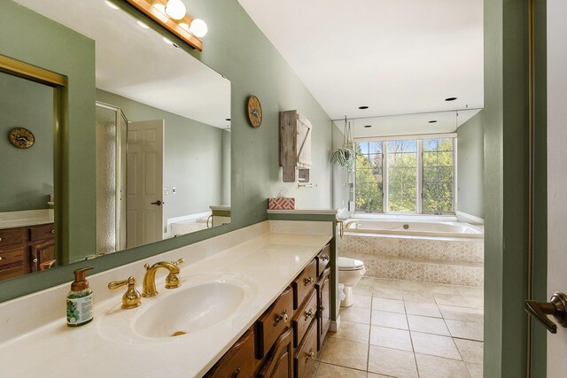 620 Twin Lakes Dr NE, Grand Rapids, MI 49525 - full bath with a garden tub, tile patterned flooring, toilet, and vanity