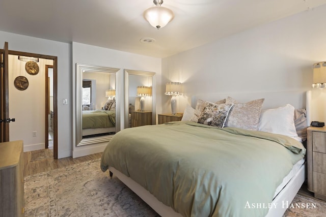 5615 Egypt Valley Ave NE, Belmont, MI 49306 - bedroom with wood finished floors and baseboards